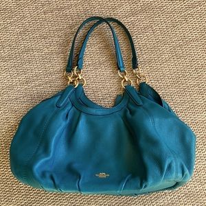 Coach Turquoise leather purse w/ gold tone accent